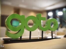 Saham GOTO Melemah Saat Isu Merger dengan Grab Mencuat
